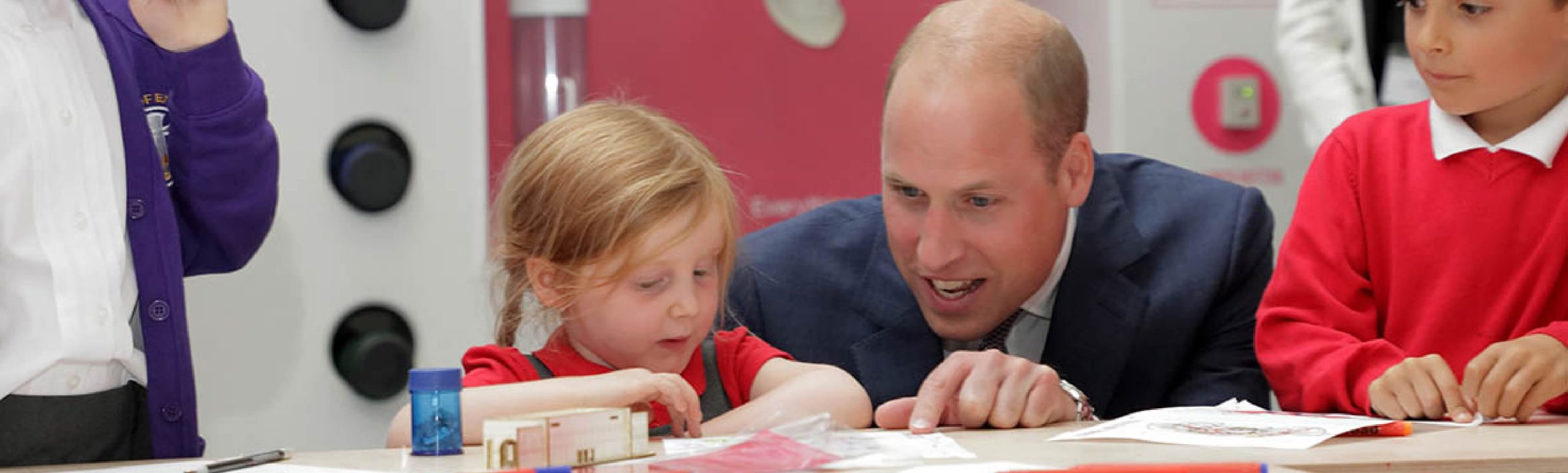 Prince William talks to child